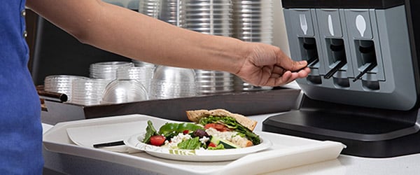 disposable utensil dispenser at the hotel lobby food corner