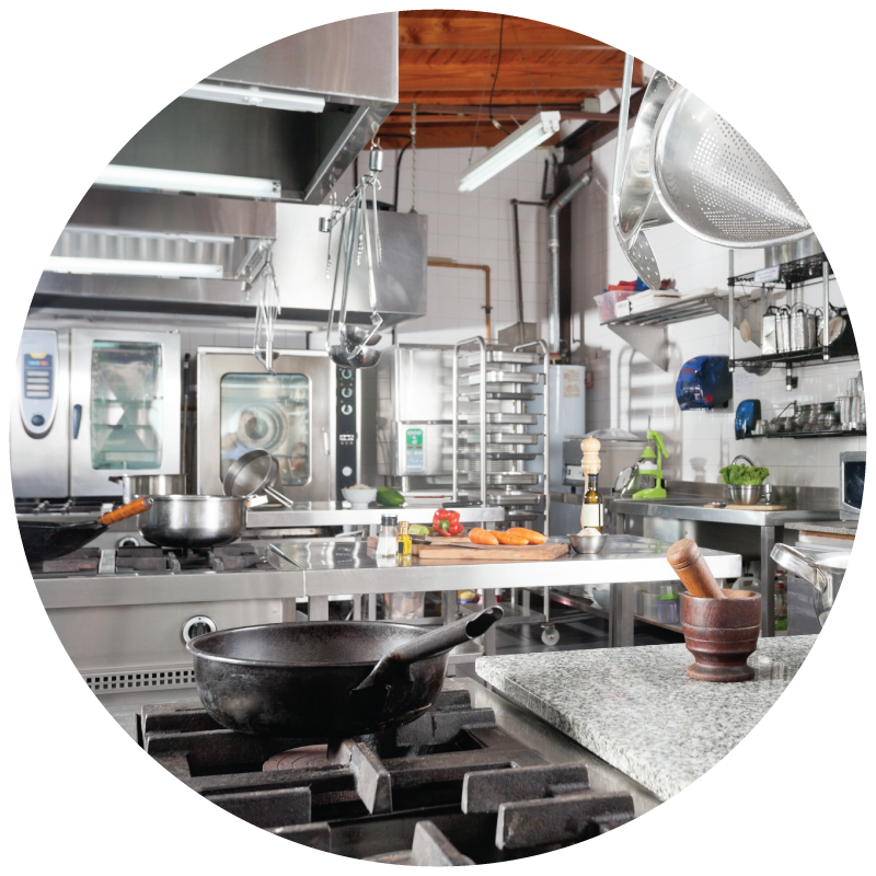 An image of a clean and modernized commercial kitchen with equipment