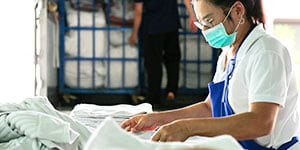 hotel staff wearing mask - PPE