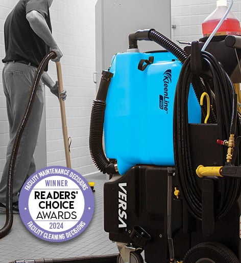 facility manager using KleenLine Pro Versa no-touch cleaning caddy