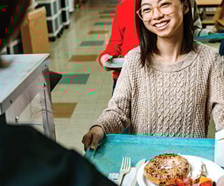a student using school cafeteria to get lunch