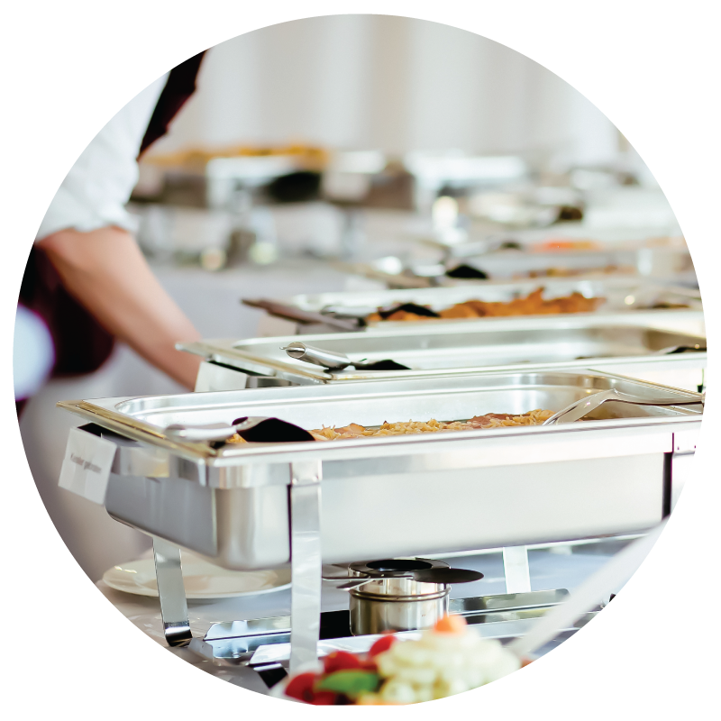 An image of catering food warmers with food in them for buffet