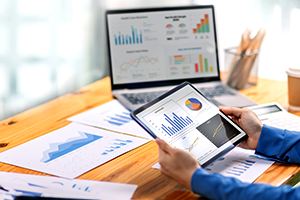 streamlined procurement and supply chain, person working on financial report