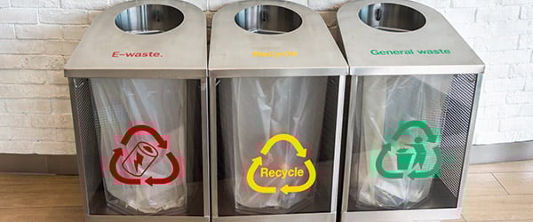 different recycling bins at the hotel lobby