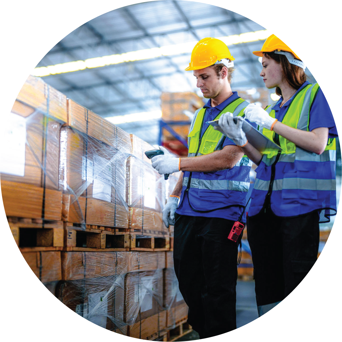 Warehouse workers working on preparing larger palletized shipments