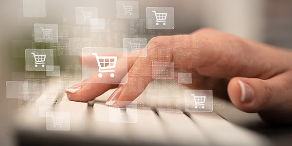 a hand on a keyboard online shopping