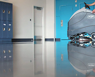 auto scrubber working on a concret floor