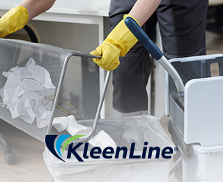 a janitor emptying out the garbage