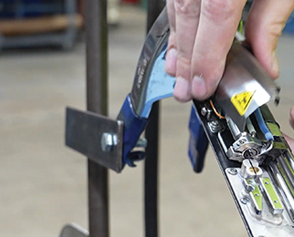 a technician repairing packaging equipment parts