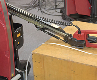 Strapping machine-packaging equipment