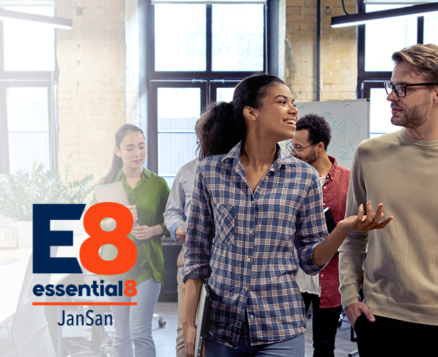 office staff talking to each other in an office